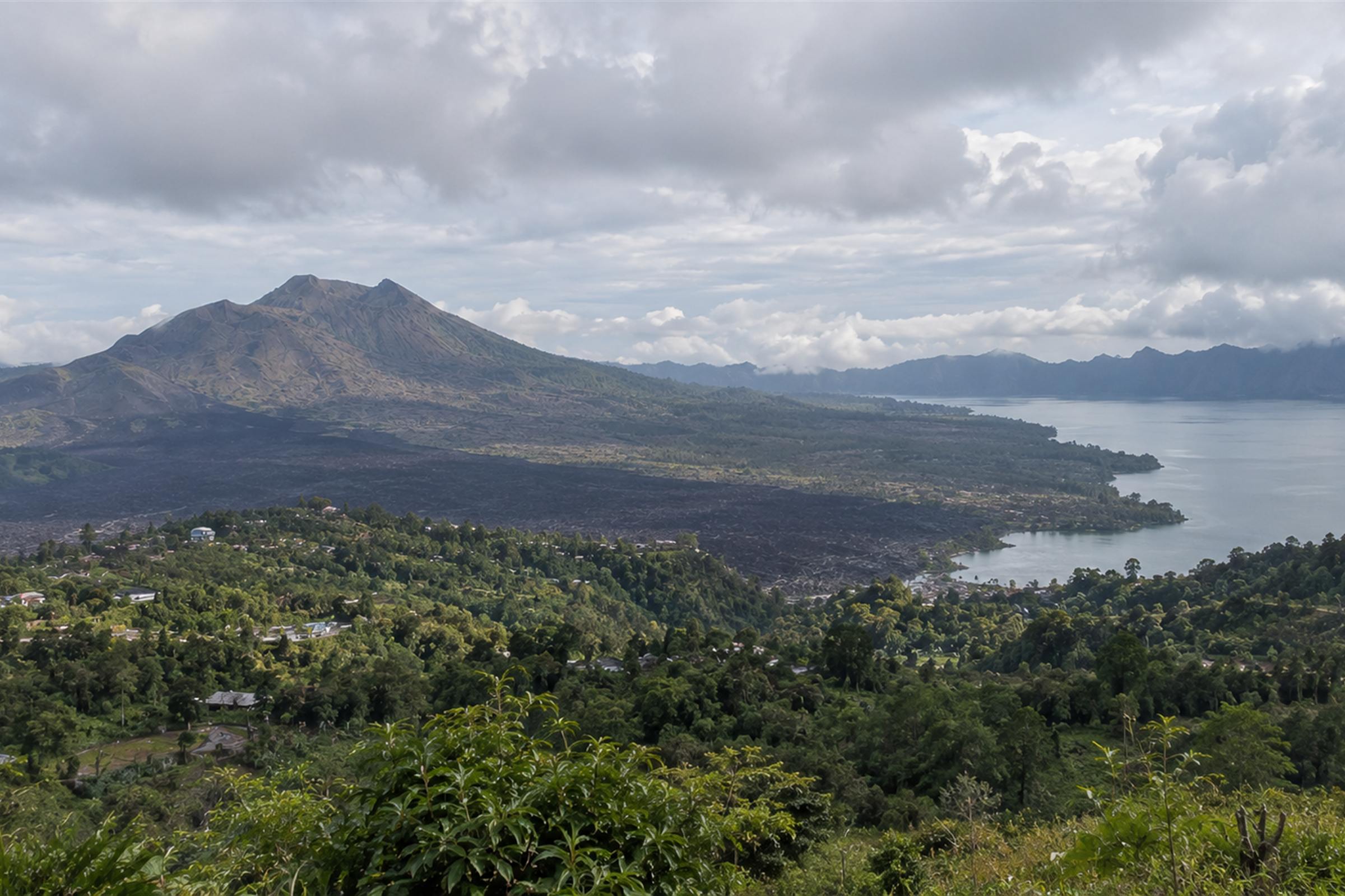 Mount Batur and Lake Batur seen from the caldera rim at Kintamani